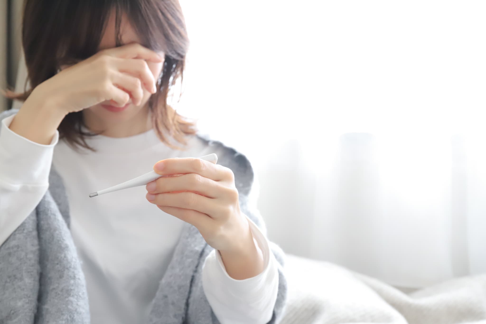 梅毒になり発熱した女性