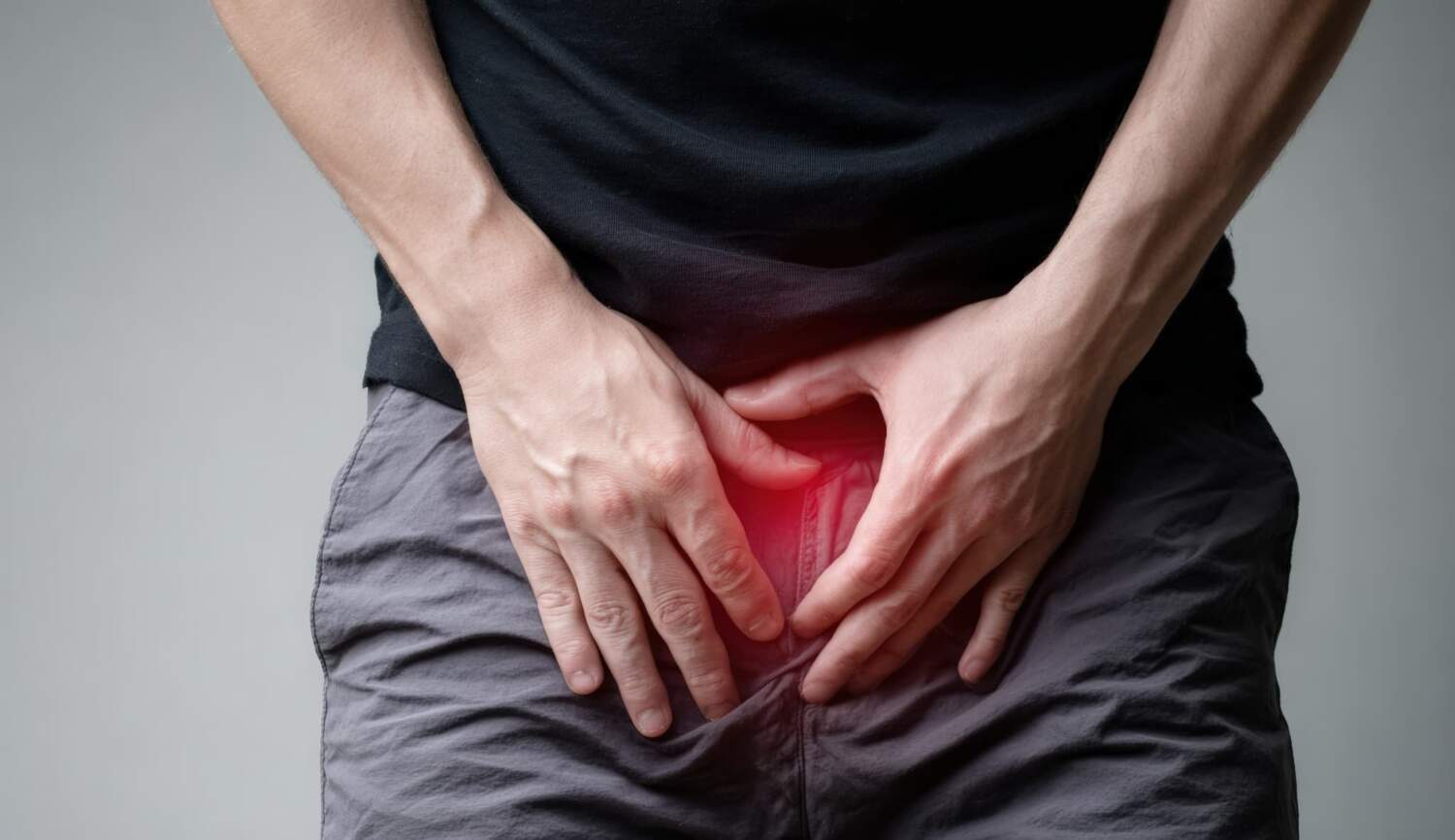 性病で性器に痛みを感じるイメージ