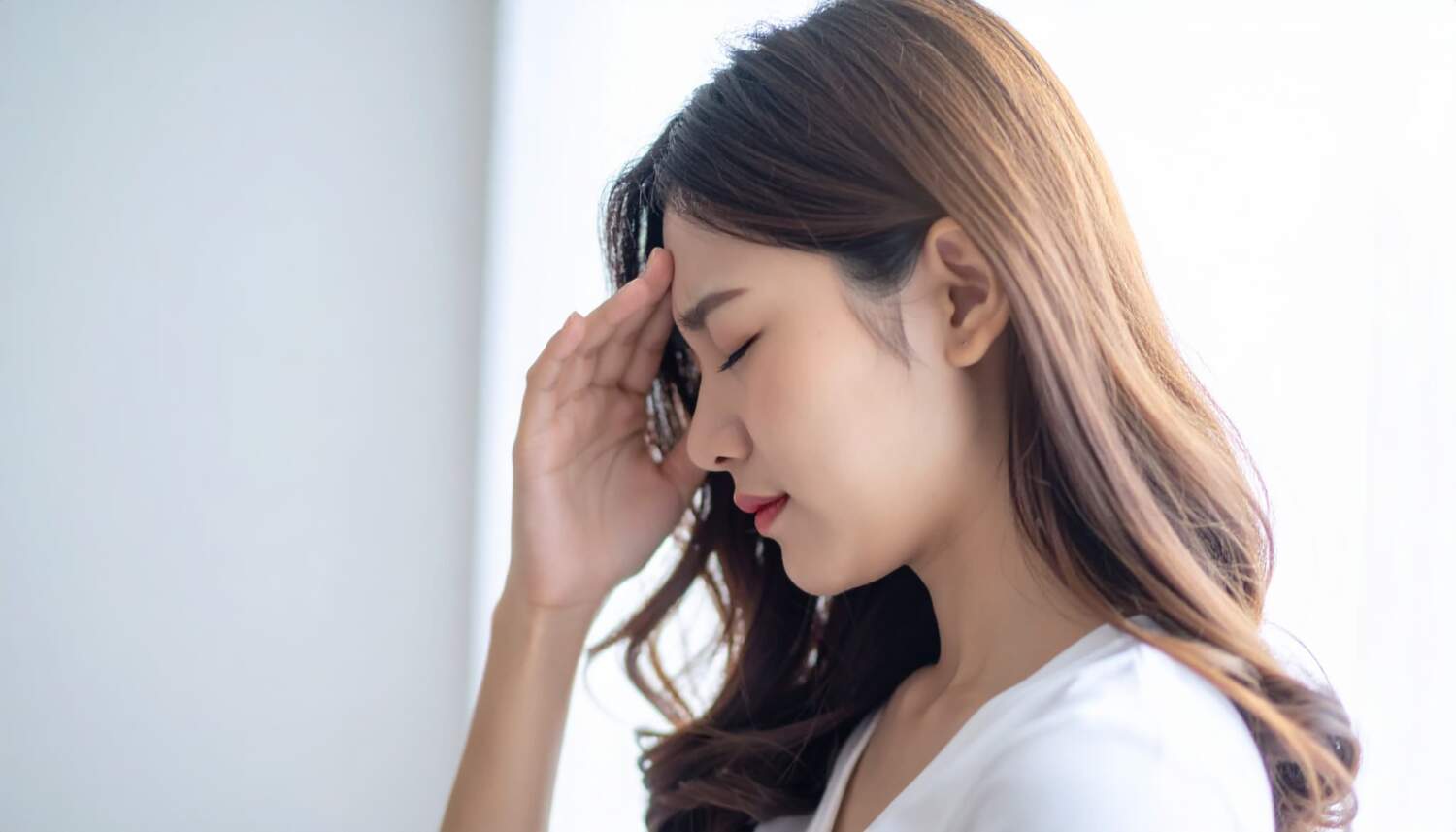 アフターピルの副作用で頭が痛くなった女性